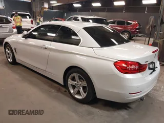 2015 BMW 4 Series 428i xDrive with VIN WBA3T1C52FP821020, listed as a IAAI auction lot 42004707 with 74,951 mi miles and . Bid and sale history available at carsss.com. Image 3.