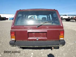 1995 Jeep Cherokee Country with VIN 1J4FT78S9SL617148, listed as a Copart auction lot 43015025 with 196,408 mi miles and Clean title. Bid and sale history available at DreamBid. Image 6.