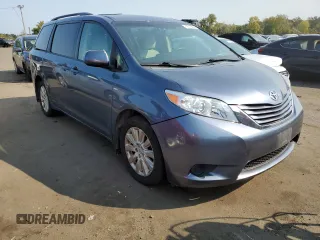 2016 Toyota Sienna LE with VIN 5TDJK3DC2GS133323, listed as a Copart auction lot 70515664 with 106,750 mi miles and Salvage Title. Bid and sale history available at carsss.com. Image 4.