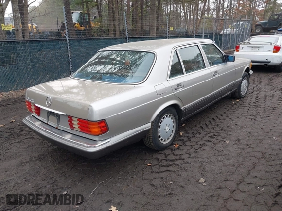 1987 Mercedes-Benz 560 with VIN WDBCA39D5HA357048, listed as a IAAI auction lot 41672343 with 151,635 mi miles and . Bid and sale history available at DreamBid. Image 4.