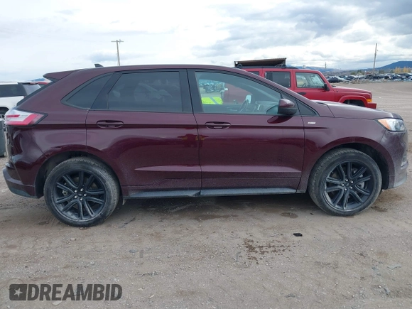 2021 Ford Edge SEL z VIN 2FMPK4J9XMBA59022, wystawiony jako IAAI lot #40596255 z przebiegiem 41 770 mil mil oraz . Historia ofert i sprzedaży dostępna na DreamBid. Obrazek 13.