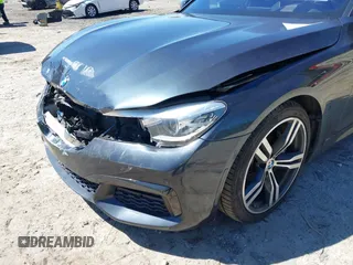 2016 BMW 7 Series 740i with VIN WBA7E2C54GG714649, listed as a IAAI auction lot 41815220 with 89,029 mi miles. Bid and sale history available at carsss.com. Image 6.