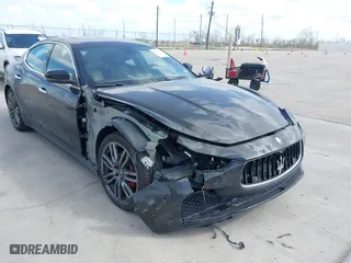 2017 Maserati Ghibli with VIN ZAM57XSA6H1218753, listed as a IAAI auction lot 41833235 with 42,135 mi miles. Bid and sale history available at carsss.com. Image 6.