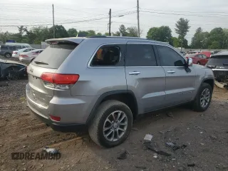 2014 Jeep Grand Cherokee Limited with VIN 1C4RJFBG8EC496303, listed as a Copart auction lot 56215195 with 129,269 mi miles and Salvage Title. Bid and sale history available at DreamBid. Image 3.