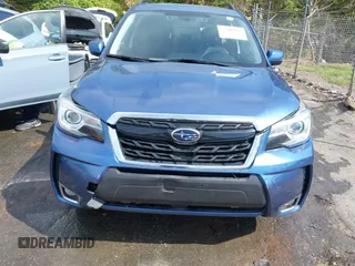 2017 Subaru Forester Touring with VIN JF2SJGWC5HH567870, listed as a IAAI auction lot 42007542 with 76,560 mi miles. Bid and sale history available at carsss.com. Image 12.