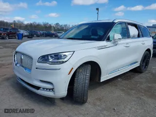 2021 Lincoln Aviator Reserve with VIN 5LM5J7XC3MGL11441, listed as a IAAI auction lot 41986754 with 104,088 mi miles. Bid and sale history available at carsss.com. Image 2.