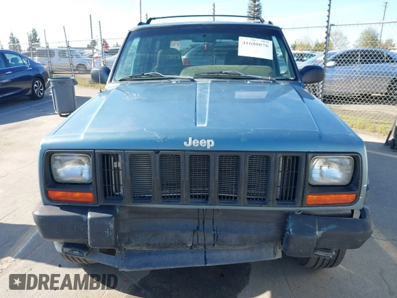 1998 Jeep Cherokee Sport with VIN 1J4FT68S0WL231959, listed as a IAAI auction lot 41680076 with 252,369 mi miles. Bid and sale history available at carsss.com. Image 12.