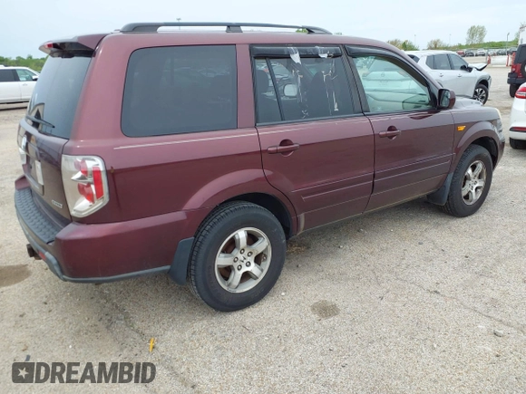 2007 Honda Pilot EX-L with VIN 5FNYF18537B021184, listed as a IAAI auction lot 42142092 with 245,462 mi miles. Bid and sale history available at carsss.com. Image 4.