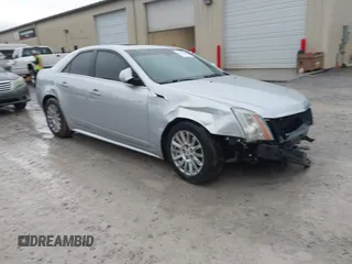 2013 Cadillac CTS Premium with VIN 1G6DP5E37D0153206, listed as a IAAI auction lot 41150664 with 130,194 mi miles and . Bid and sale history available at DreamBid. Image 1.