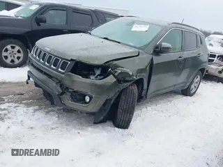 2018 Jeep Compass Altitude with VIN 3C4NJDBB1JT479462, listed as a IAAI auction lot 41276119 with 58,895 mi miles and . Bid and sale history available at carsss.com. Image 2.