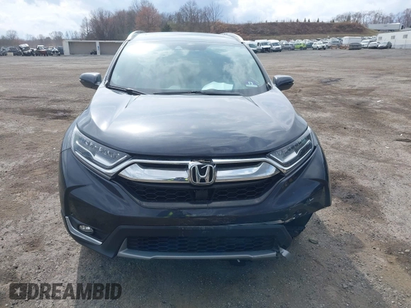 2019 Honda CR-V Touring with VIN 2HKRW2H9XKH636354, listed as a IAAI auction lot 41902615 with 66,781 mi miles and . Bid and sale history available at DreamBid. Image 12.