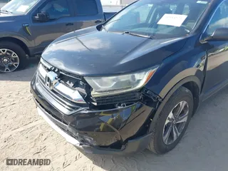 2017 Honda CR-V LX with VIN 7FARW5H33HE001050, listed as a IAAI auction lot 41944571 with 61,159 mi miles. Bid and sale history available at carsss.com. Image 6.