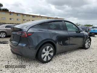 2024 Tesla Model Y with VIN 7SAYGDED2RF040079, listed as a Copart auction lot 57237054 with 2,549 mi miles and Non Repairable. Bid and sale history available at DreamBid. Image 3.
