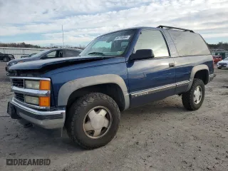1999 Chevrolet Tahoe with VIN 3GNEK18R4XG124715, listed as a Copart auction lot 84744304 with 276,891 mi miles and Clean Title. Bid and sale history available at carsss.com. Image 1.