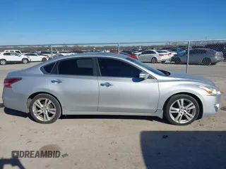 2014 Nissan Altima SL with VIN 1N4BL3AP7EC412585, listed as a IAAI auction lot 41647667 with 120,193 mi miles and . Bid and sale history available at DreamBid. Image 13.