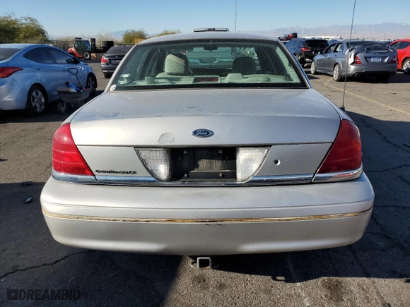 2005 Ford Crown Victoria LX with VIN 2FAFP74W75X165930, listed as a Copart auction lot 81641294 with 138,521 mi miles and Clean Title. Bid and sale history available at carsss.com. Image 6.