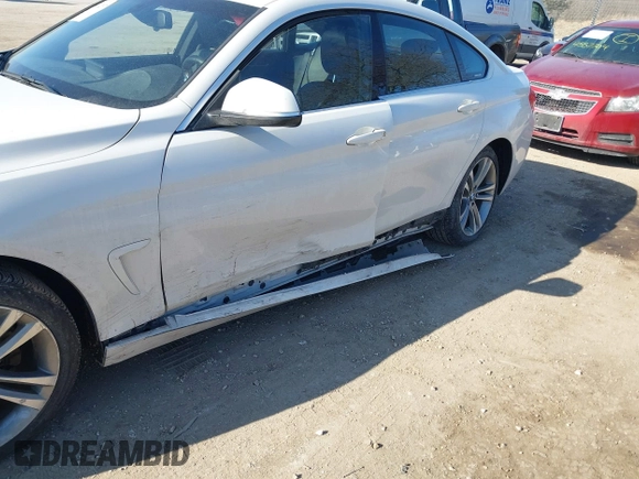 2016 BMW 4 Series 428i xDrive with VIN WBA4C9C59GG138090, listed as a IAAI auction lot 41560267 with 94,010 mi miles and . Bid and sale history available at carsss.com. Image 6.