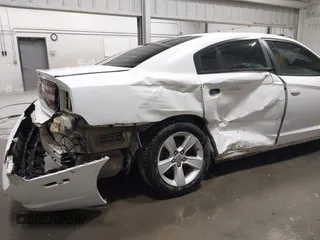 2013 Dodge Charger SE with VIN 2C3CDXBG0DH537056, listed as a IAAI auction lot 42047266 with 132,412 mi miles and . Bid and sale history available at DreamBid. Image 6.
