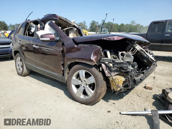 2012 Kia Sorento EX with VIN 5XYKU4A62CG222061, listed as a Copart auction lot 71044124 with 218,770 mi miles and Salvage Title. Bid and sale history available at carsss.com. Image 4.