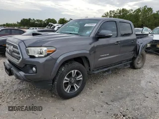 2017 Toyota Tacoma SR5 with VIN 5TFAZ5CN7HX042764, listed as a Copart auction lot 52104525 with 296,945 mi miles and Salvage title. Bid and sale history available at DreamBid. Image 1.