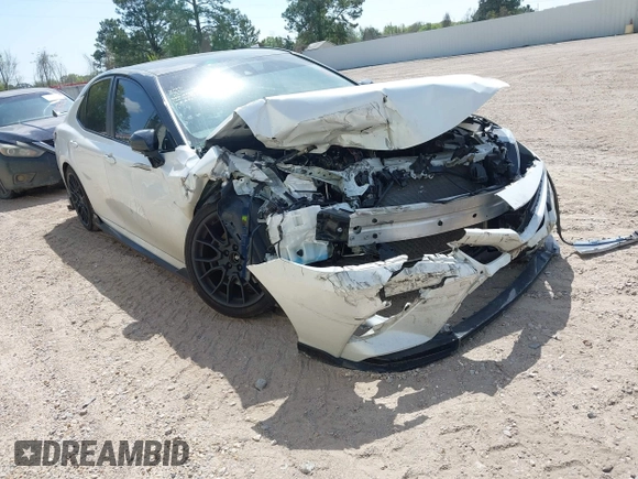 2022 Toyota Camry TRD with VIN 4T1KZ1AK6NU069341, listed as a IAAI auction lot 41881252 with 55,871 mi miles and . Bid and sale history available at DreamBid. Image 1.