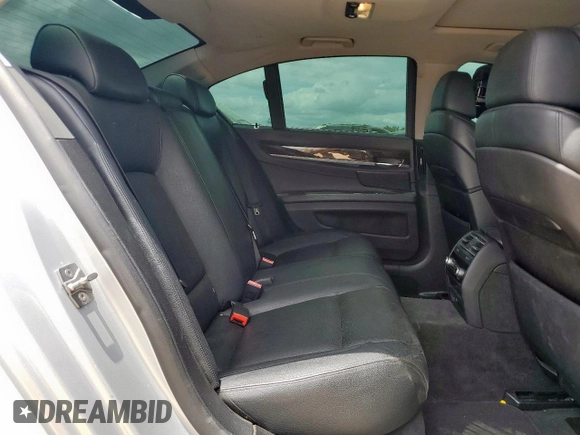 2012 BMW 7 Series 740i with VIN WBAKA4C5XCC613599, listed as a Copart auction lot 62951835 with 102,534 mi miles and Clean title. Bid and sale history available at DreamBid. Image 10.