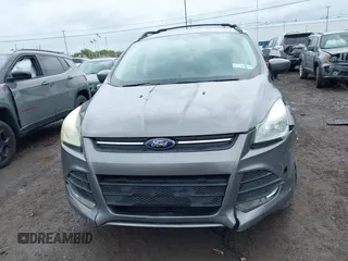 2013 Ford Escape SE with VIN 1FMCU9GX9DUA57901, listed as a IAAI auction lot 42367615 with 140,000 mi miles and . Bid and sale history available at DreamBid. Image 12.
