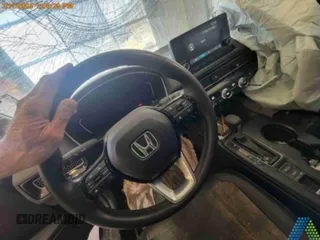 2024 Honda Civic EX-L z VIN 19XFL1H79RE015965, wystawiony jako Copart lot #49991195 z przebiegiem Nie podano mil oraz Szkoda całkowita • Salvage title. Historia ofert i sprzedaży dostępna na DreamBid. Obrazek 2.