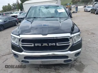 2020 Ram 1500 Big Horn z VIN 1C6RRFFGXLN109231, wystawiony jako IAAI lot #41881564 z przebiegiem 93 879 mil mil oraz . Historia ofert i sprzedaży dostępna na DreamBid. Obrazek 13.