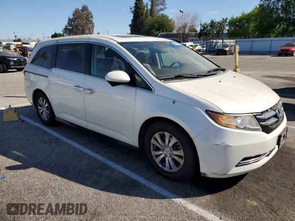 2014 Honda Odyssey EX-L with VIN 5FNRL5H6XEB060557, listed as a Copart auction lot 47141835 with 214,718 mi miles and Clean Title. Bid and sale history available at DreamBid. Image 4.