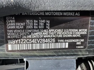 2014 BMW i3 with VIN WBY1Z2C54EV284626, listed as a Copart auction lot 61809165 with 27,008 mi miles and Clean title. Bid and sale history available at DreamBid. Image 15.