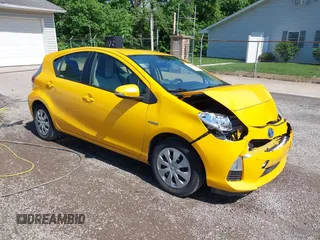 2014 Toyota Prius One z VIN JTDKDTB31E1066984, wystawiony jako IAAI lot #42261574 z przebiegiem 163 378 mil mil oraz . Historia ofert i sprzedaży dostępna na DreamBid. Obrazek 1.