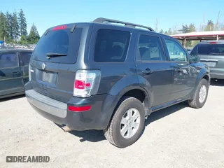 2010 Mercury Mariner with VIN 4M2CN9B75AKJ15058, listed as a IAAI auction lot 42042347 with 220,242 mi miles. Bid and sale history available at carsss.com. Image 4.