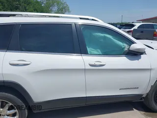 2015 Jeep Cherokee Limited with VIN 1C4PJLDS8FW566065, listed as a IAAI auction lot 42032563 with 181,937 mi miles and . Bid and sale history available at DreamBid. Image 12.