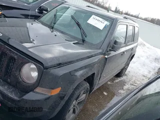 2015 Jeep Patriot High Altitude with VIN 1C4NJRFB0FD272338, listed as a IAAI auction lot 41448363 with 131,170 mi miles and . Bid and sale history available at carsss.com. Image 2.