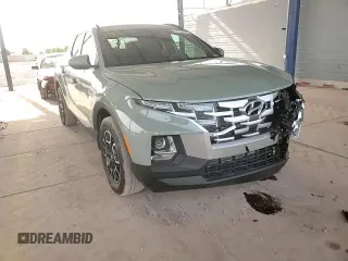 2023 Hyundai Santa Cruz SEL z VIN 5NTJC4AE8PH044985, wystawiony jako Copart lot #84774144 z przebiegiem 11 643 mil mil oraz Szkoda całkowita • Salvage title. Historia ofert i sprzedaży dostępna na DreamBid. Obrazek 12.