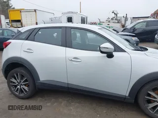 2017 Mazda CX-3 Touring with VIN JM1DKFC77H0155101, listed as a IAAI auction lot 41722040 with 92,653 mi miles. Bid and sale history available at carsss.com. Image 14.
