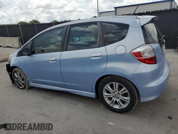 2010 Honda Fit Sport with VIN JHMGE8H64AC032634, listed as a Copart auction lot 61795825 with 143,593 mi miles and Salvage title. Bid and sale history available at DreamBid. Image 2.