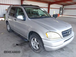 2001 Mercedes-Benz M-Class with VIN 4JGAB54E21A250865, listed as a IAAI auction lot 42111259 with 261,546 mi miles. Bid and sale history available at carsss.com. Image 1.