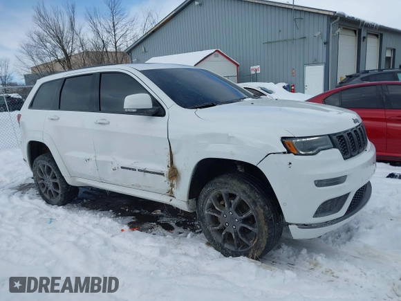 2020 Jeep Grand Cherokee Overland with VIN 1C4RJFCG6LC439142, listed as a IAAI auction lot 41640385 with 74,300 mi miles. Bid and sale history available at carsss.com. Image 13.