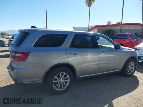 2016 Dodge Durango SXT with VIN 1C4RDHAG7GC502857, listed as a IAAI auction lot 40690221 with 192,620 mi miles and . Bid and sale history available at DreamBid. Image 14.