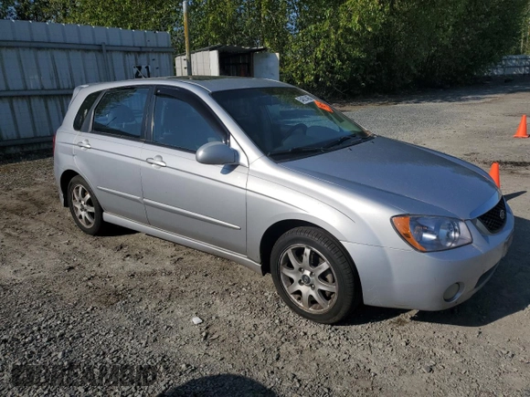 2005 Kia Spectra with VIN KNAFE161355121968, listed as a Copart auction lot 54621465 with 221,951 mi miles and Clean Title. Bid and sale history available at carsss.com. Image 4.