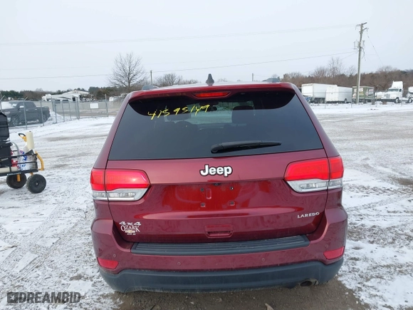 2018 Jeep Grand Cherokee Laredo E with VIN 1C4RJFAG9JC504596, listed as a IAAI auction lot 41595149 with 93,713 mi miles. Bid and sale history available at carsss.com. Image 16.