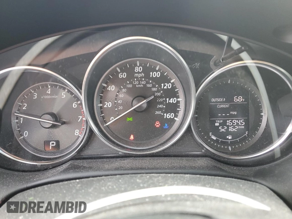 2014 Mazda CX-5 Touring with VIN JM3KE4CY3E0381134, listed as a Copart auction lot 52115015 with 52,162 mi miles and Salvage Title. Bid and sale history available at carsss.com. Image 9.