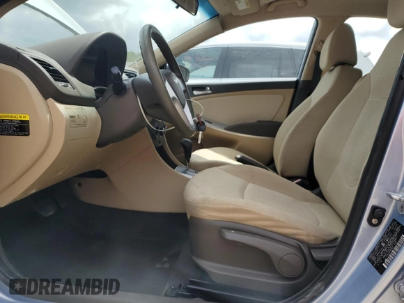 2012 Hyundai Accent GLS with VIN KMHCT4AEXCU037989, listed as a Copart auction lot 53439415 with 102,948 mi miles and Salvage Title. Bid and sale history available at carsss.com. Image 7.