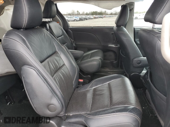 2016 Toyota Sienna SE with VIN 5TDXK3DC0GS725247, listed as a Copart auction lot 48266475 with 100,122 mi miles and Salvage title. Bid and sale history available at DreamBid. Image 12.