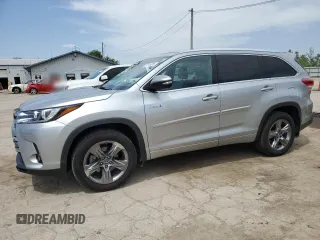 2019 Toyota Highlander Hybrid Limited with VIN 5TDDGRFH4KS069904, listed as a Copart auction lot 57319055 with 75,333 mi miles and Salvage title. Bid and sale history available at DreamBid. Image 1.