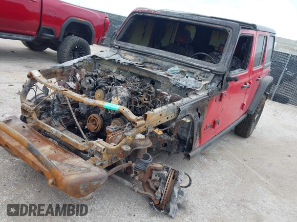 2021 Jeep Wrangler Unlimited Rubicon with VIN 1C4JJXFM1MW830218, listed as a IAAI auction lot 39934037 with Not provided miles and . Bid and sale history available at DreamBid. Image 2.