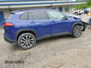 2022 Toyota Corolla Cross XLE with VIN 7MUDAABGXNV042443, listed as a Copart auction lot 57808565 with 102,887 mi miles and Salvage title. Bid and sale history available at DreamBid. Image 3.