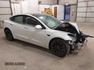 2021 Tesla Model 3 Performance with VIN 5YJ3E1ECXMF991836, listed as a IAAI auction lot 41830519 with Not Provided miles and . Bid and sale history available at carsss.com. Image 1.